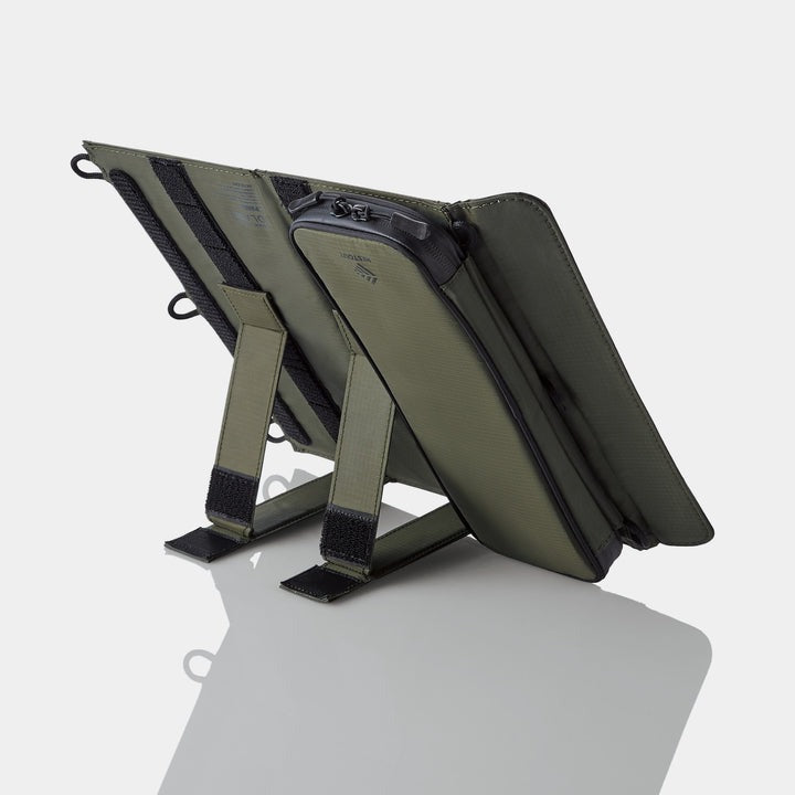 back view of NESTOUT solar panel camping charger with Velcro stand and zip up pouch - solar power generator